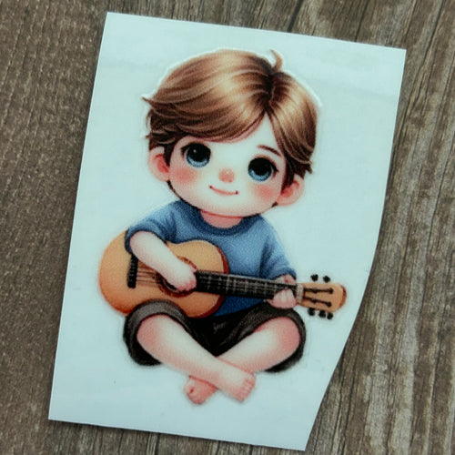 UV100 - UVDTF - Decal only - Child playing guitar - Olifantjie - Wooden - MDF - Lasercut - Blank - Craft - Kit - Mixed Media - UK